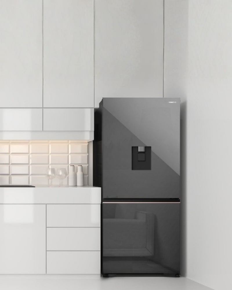 Panasonic Prime+ 500L two-door fridge in a modern white kitchen.