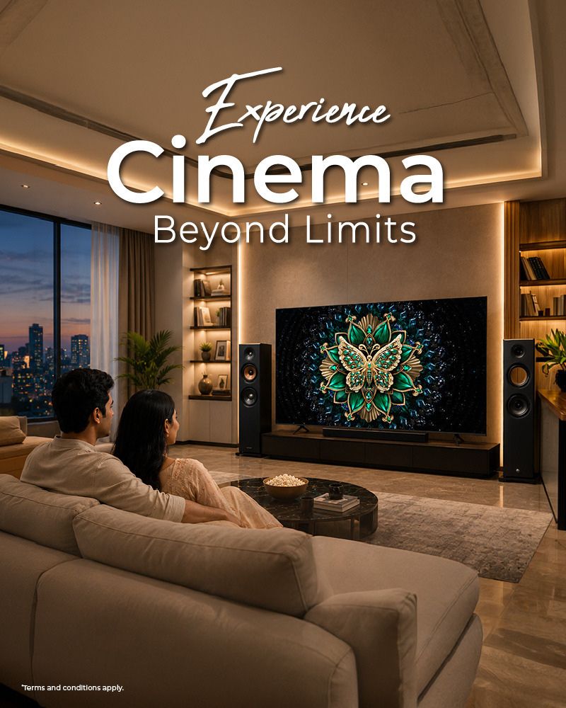 A couple watching TCL C6K Series TV in a modern living room