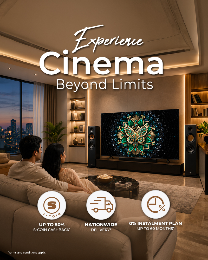 A couple watching TCL C6K Series TV in a modern living room