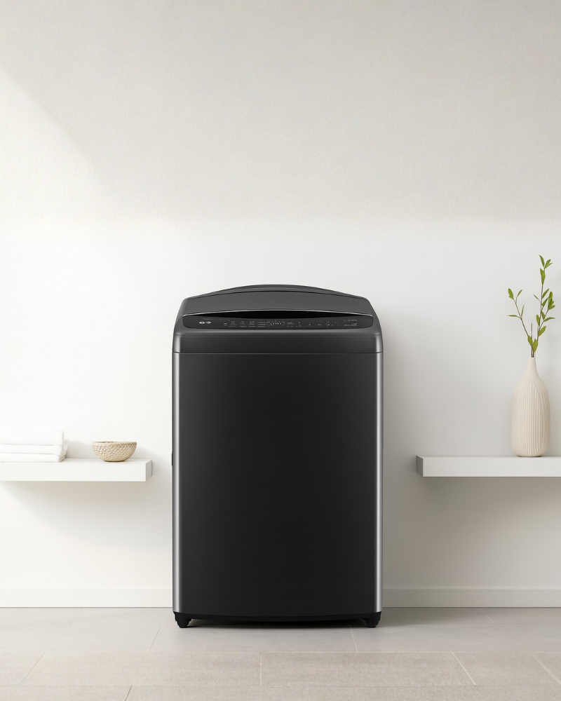 The LG 20kg top-load washer is displayed in a minimalist white laundry room with floating shelves, decor pieces, and a tiled floor.