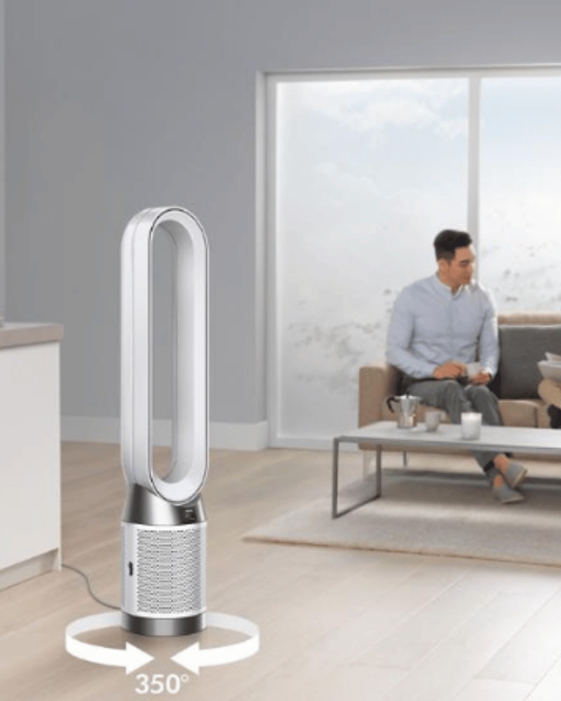 Dyson TP10 tower air purifier in a bright living room.