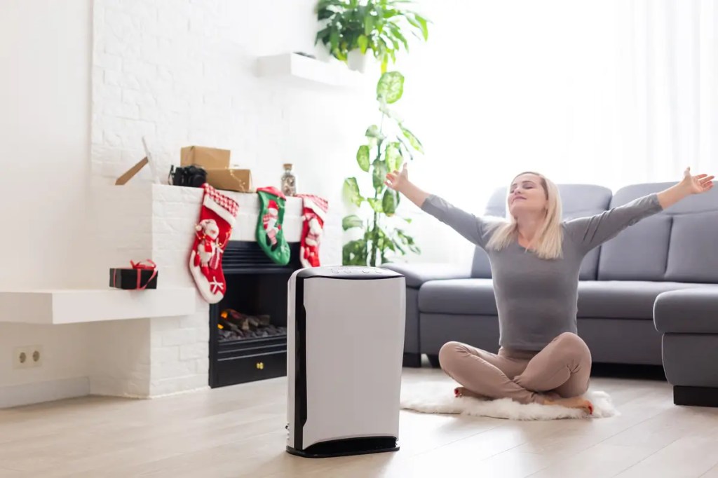 Portable Aircond Guide. An eco-friendly and high-quality air conditioner in a modern living room setting.